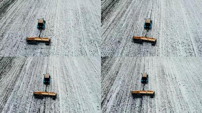 广泛和近距离的各种镜头显示施肥的土壤和准备春天使用拖拉机在农用田与层雪在冬天工作