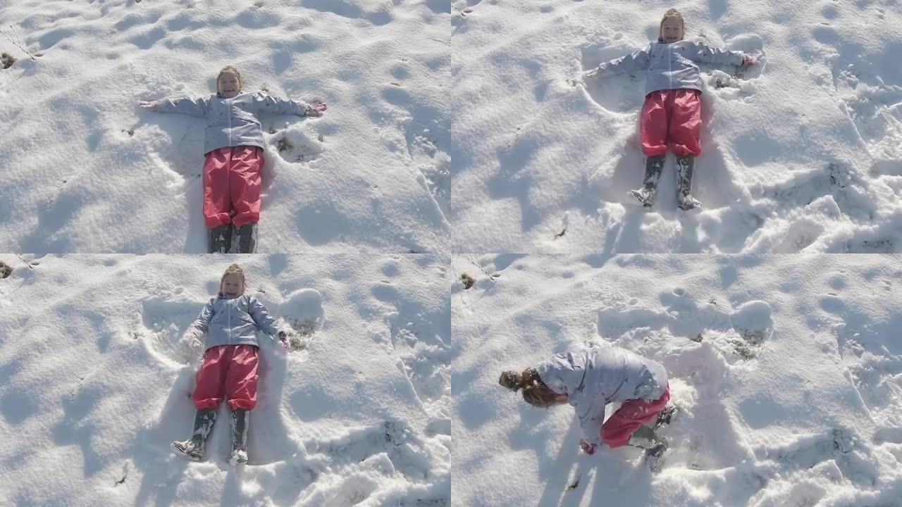 一个年轻的女孩在新鲜的雪中向后倒下，用胳膊和腿做一个雪天使