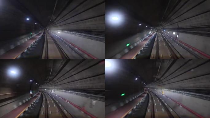 隧道中的延时自动火车驾驶，黑暗隧道中的地铁旅程视图快速4k镜头。