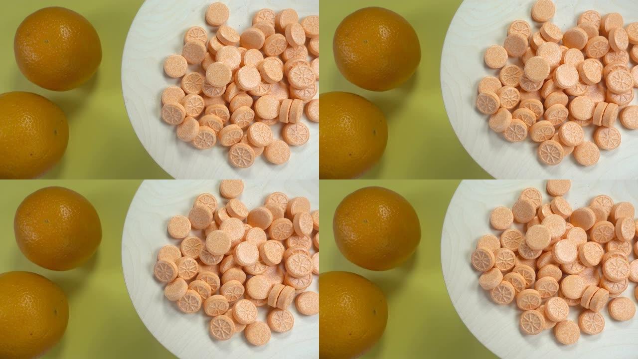 4K橘子水果旁边的盘子上的药丸