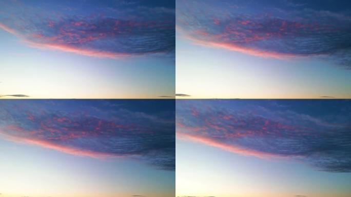 日落时分有彩色云彩的蓝天。摩尔多瓦基希讷乌