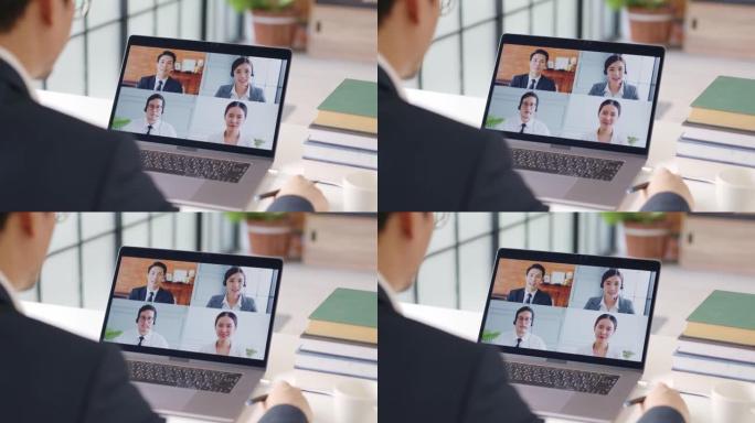 年轻的亚洲商人在家工作，与同事进行虚拟视频会议商务人员，在线工作，在家办公室进行视频通话