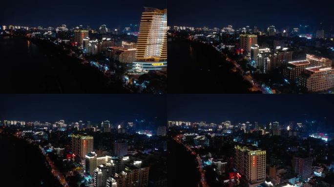 夜间照明海南岛三亚湾酒店空中全景4k中国