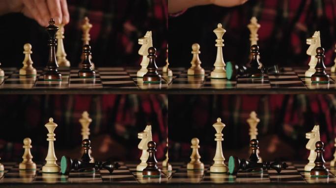 白女王在国际象棋比赛中击败黑王的前视图