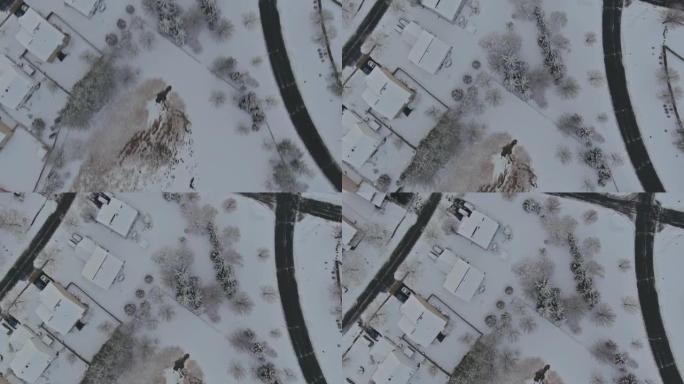 令人惊叹的空中与小镇美国主街家乡降雪后，雪树覆盖的严冬天气条件