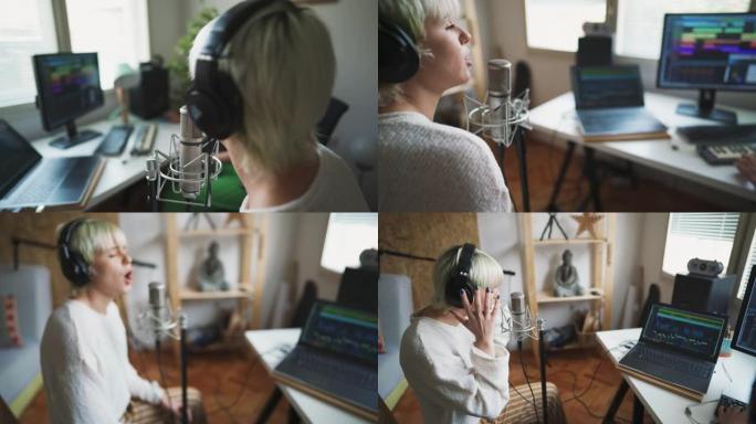 年轻女歌手在home studio与制作人录制新歌