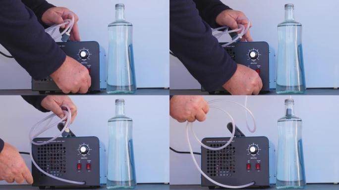 一瓶冰水用圆形臭氧化石进行臭氧化。通向氧气泵和臭氧发生器的管子