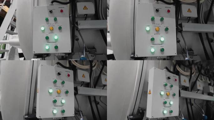 工业企业机器控制面板上各种按钮的遥控器。摄像机在运动中拍摄