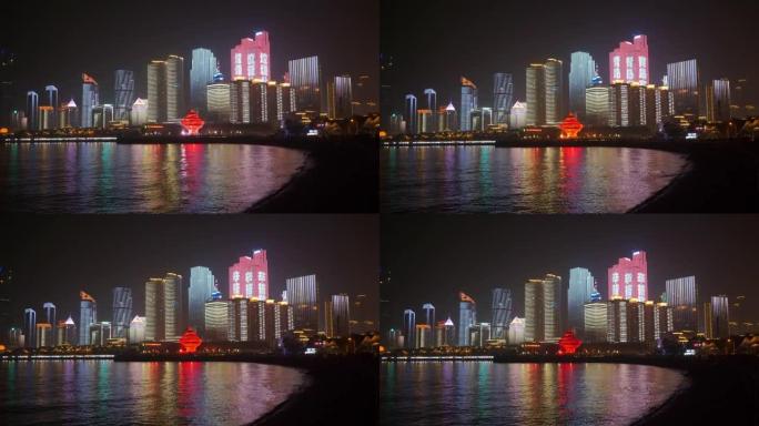 夜间照明著名的青岛市市中心表演步行湾全景4k中国