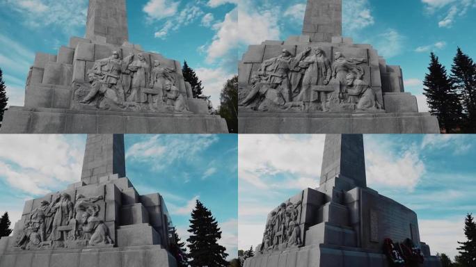 第二次世界大战士兵纪念碑的特写镜头是在太阳的背景下拍摄的。
