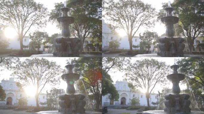 安提瓜危地马拉中央公园塞伦斯喷泉的日出 -- 美丽的殖民公园，安提瓜危地马拉有喷泉