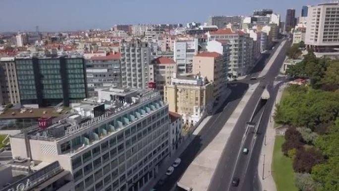 阳光明媚的日子里斯本城市景观交通街全景4k葡萄牙