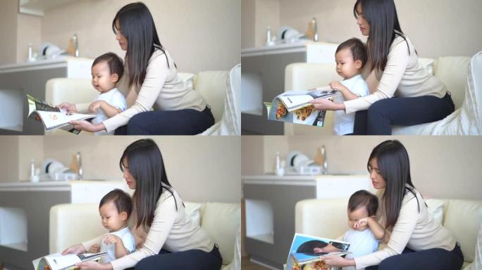 年轻的母亲在家里阅读杂志时拥抱了小男孩