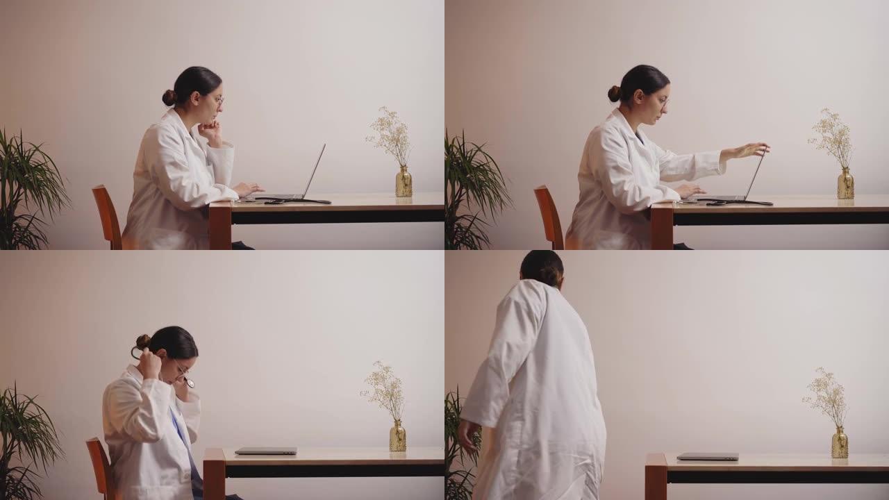 女医生刚刚结束工作。她从桌子上站起来，关上笔记本电脑离开。