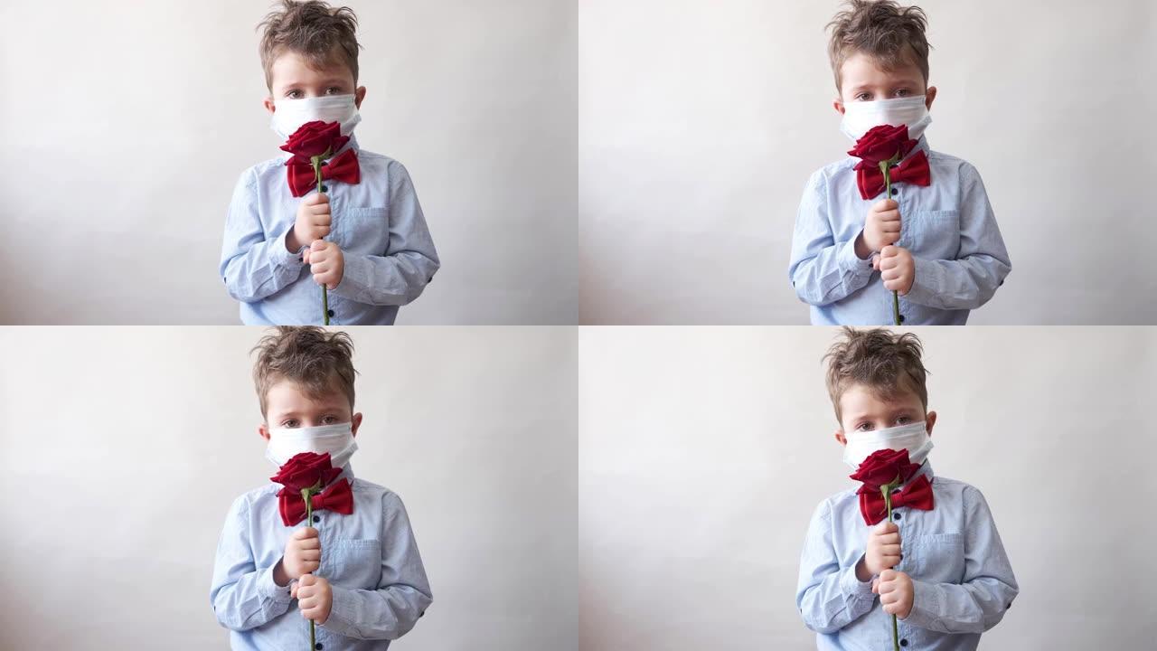可爱的男孩领结，戴着红玫瑰和保护面具。情人节。covid