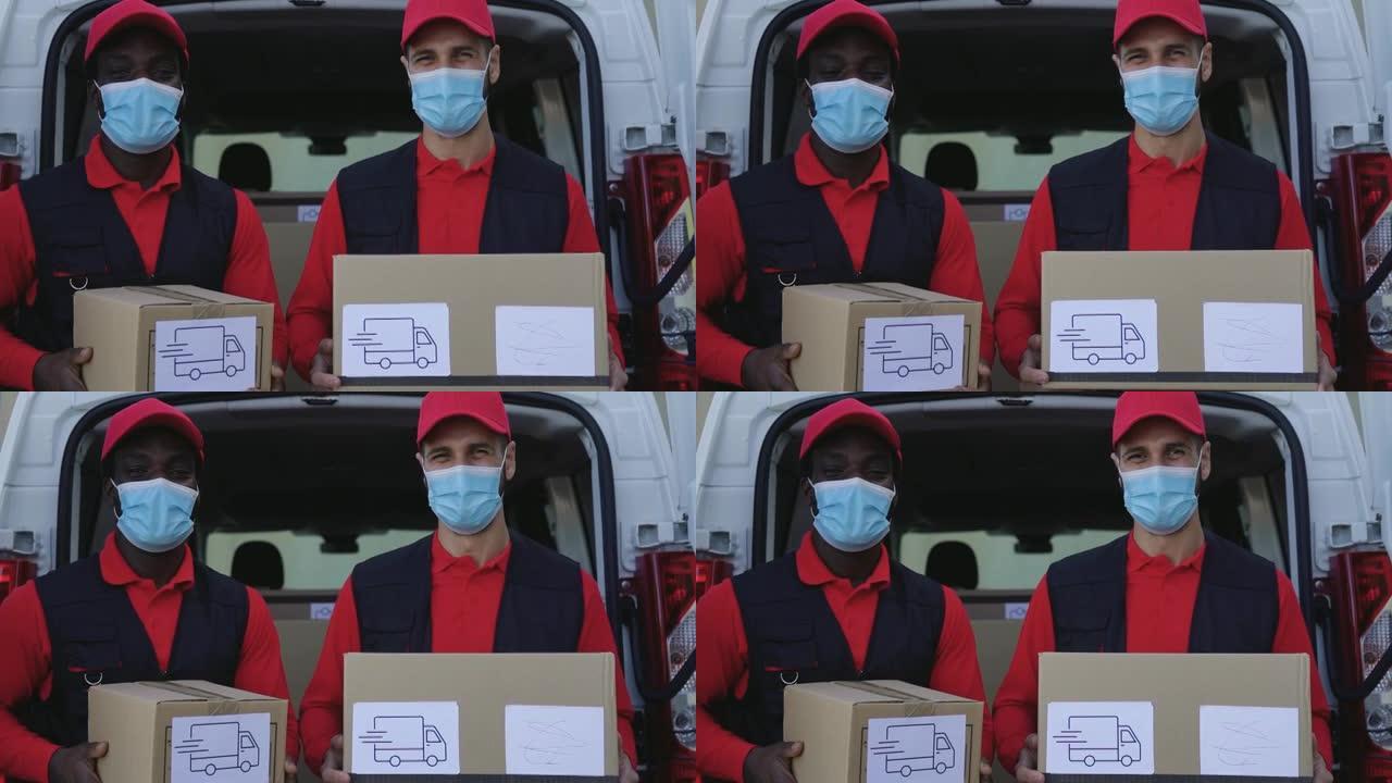 年轻的送货员戴着口罩携带纸板箱，避免电晕病毒传播 -- 在电晕病毒爆发期间与快速送货员一起工作的人