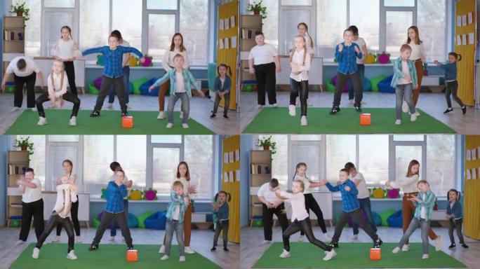 舞蹈课，健康儿童与活跃的唐氏综合症儿童一起在室内跳舞