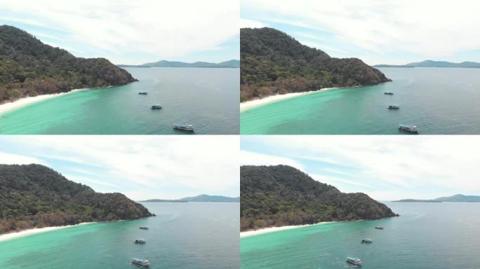 停泊的旅游旅游船在泰国南部翡翠海上的Koh Hey (珊瑚岛) 海岸排队-空中全景拍摄