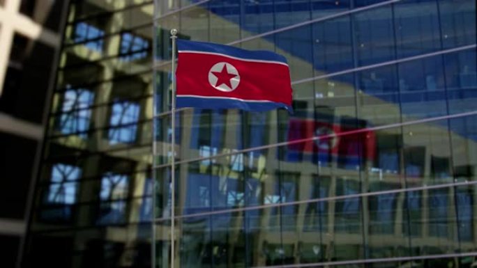 一座摩天大楼上飘扬的朝鲜国旗