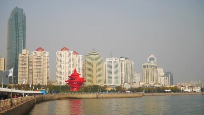 青岛市市中心阳光明媚的夜晚著名旅游奥运徒步湾全景4k中国