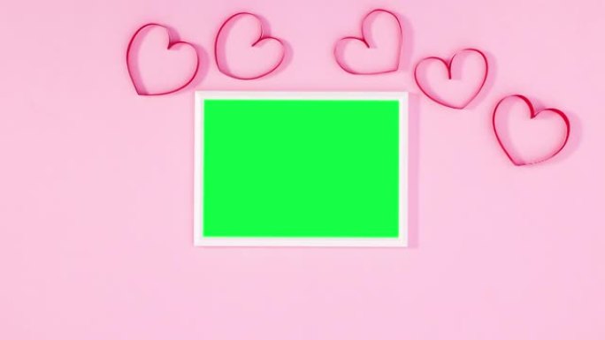 带有情人节心的绿色屏幕框架。浪漫帧停止运动