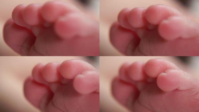 一个新生婴儿脚的脚趾在微距拍摄。皮肤上的条纹，图案