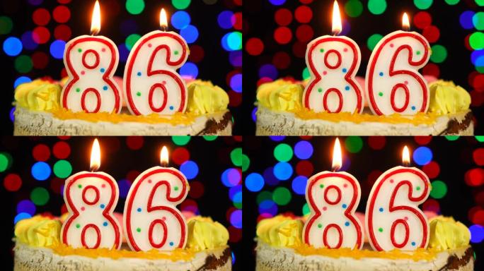 86号生日快乐蛋糕Witg燃烧蜡烛礼帽。