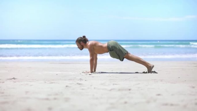 男性千禧一代做瑜伽伸展健身。