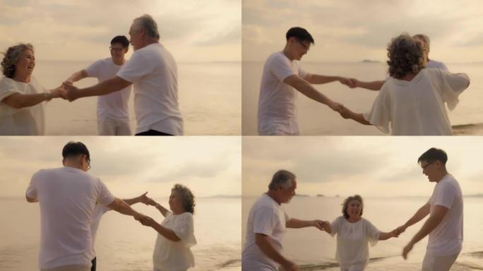 幸福亚洲家庭儿子和夫妇老人放松在日落海滩蜜月家庭一起跳舞幸福，人们的生活方式