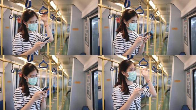 曼谷地铁里戴着医用口罩的曼谷地铁人的亚洲新常态生活。