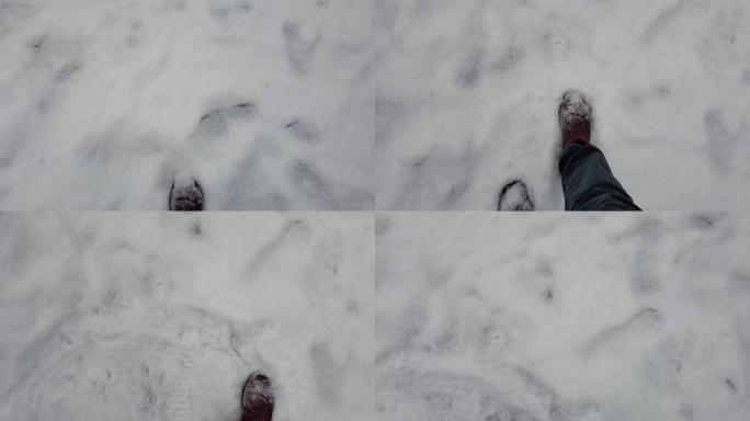 POV女性脚在慢动作中被雪踩着