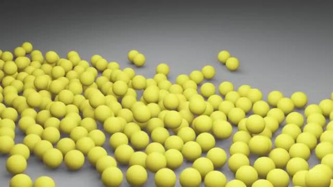 在灰色背景上落下的黄色球或球体。一年的颜色2021照明和终极灰色。3D渲染