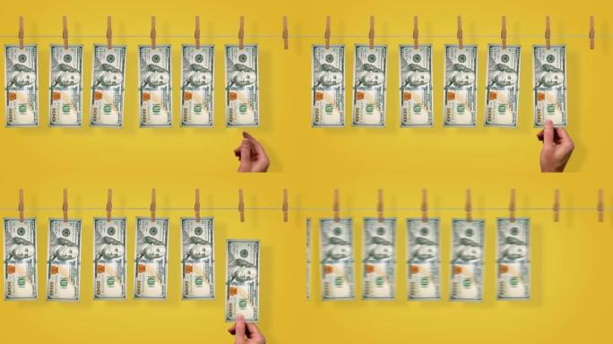 100美元的洗钱线输送机，黄色背景上的100美元钞票的正面