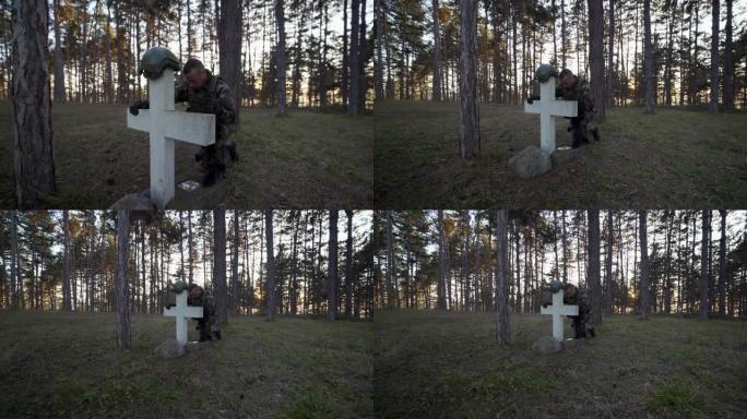 士兵们在树林里用十字墓碑悼念他的阵亡英雄，在日宽角全长的军事墓地里构想战争和死亡