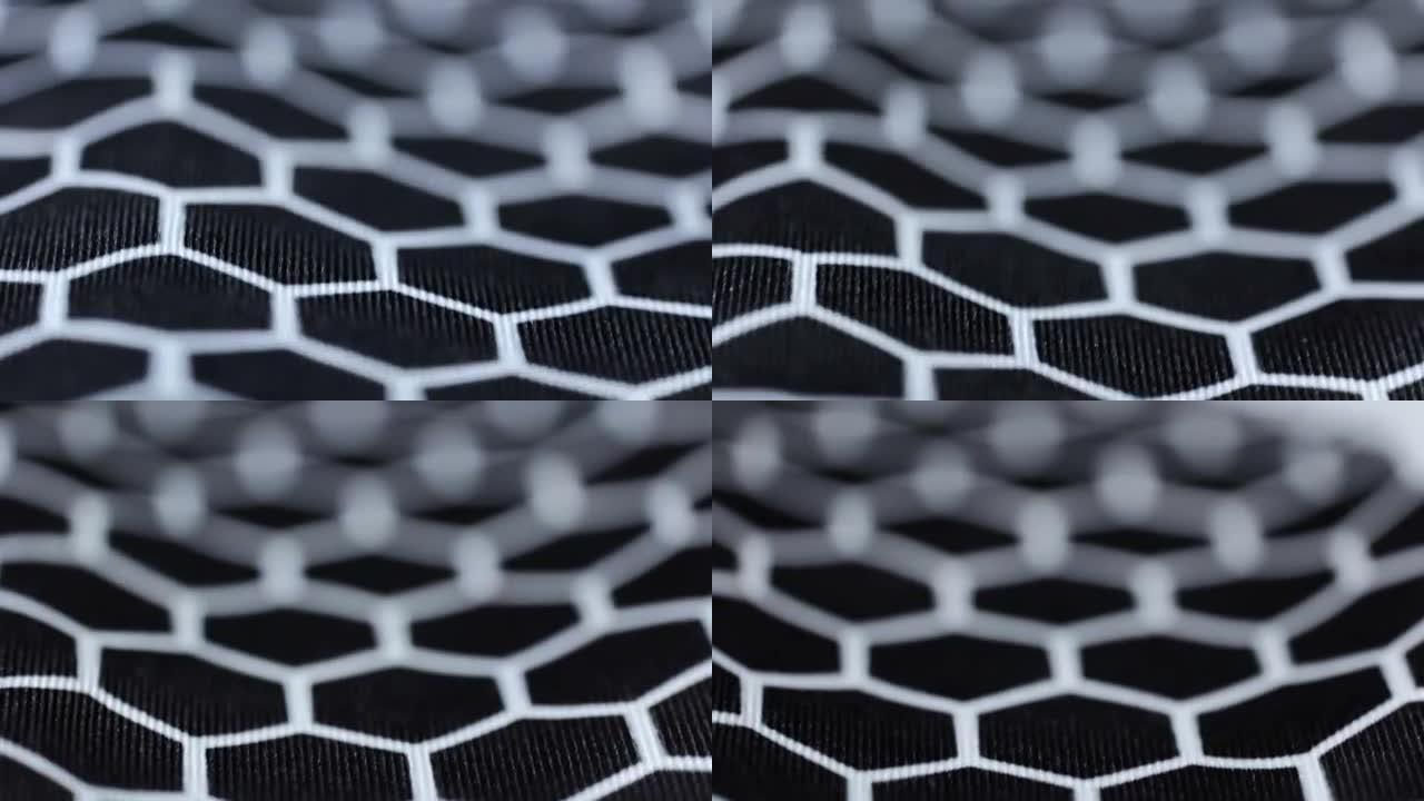 黑白六边形。织物涤纶，氨纶纺织纹理背景