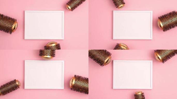 塑料框架的定格动画平放一套专业的金色圆形发刷，用于在粉红色的图像模板右侧进行造型。美发师沙龙设备概念