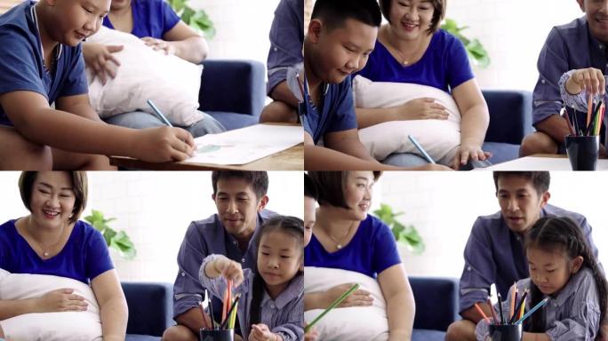 亚洲父母教儿子和女儿如何在家画画