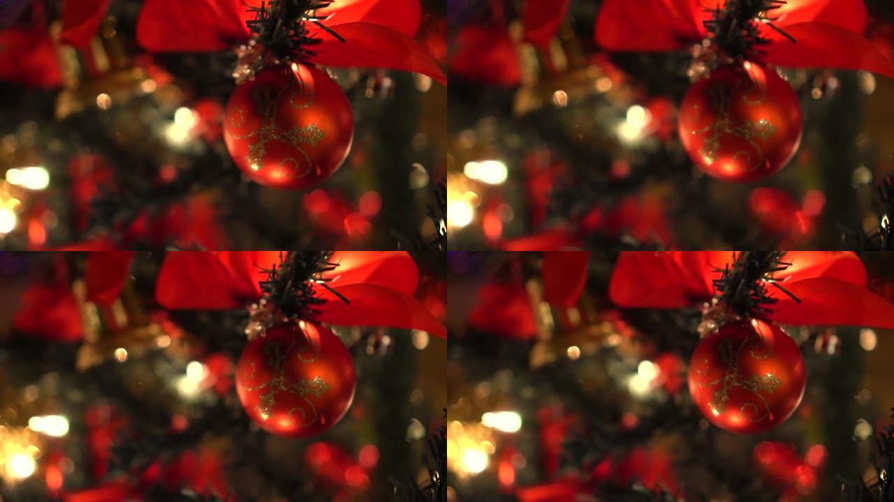 圣诞闪光红色和绿色金色装饰品挂在照明树上特写动作镜头