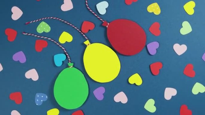 情人节背景的旋转。节日情人节背景与五彩纸心和气球。4k视频片段。爱情概念。