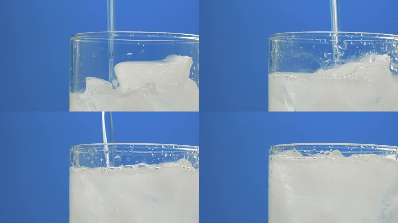 杯中的伏特加和碳酸冰。酒精与冰在平台上旋转。