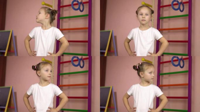一个穿着白色t恤的小女孩进行锻炼，将头向右和向左转动。