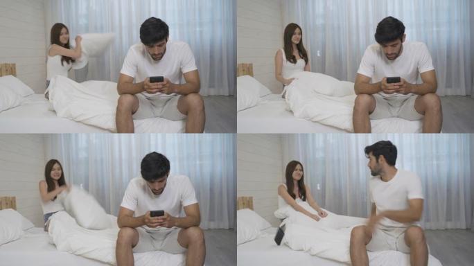 年轻夫妇亚洲女友试图引起中东男友的注意，以摆脱手机，无知与社交网络成瘾的关系。多民族。