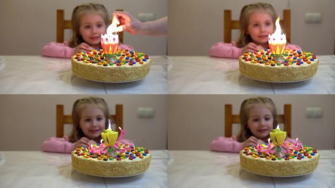这个女孩过生日。点燃蛋糕上的蜡烛