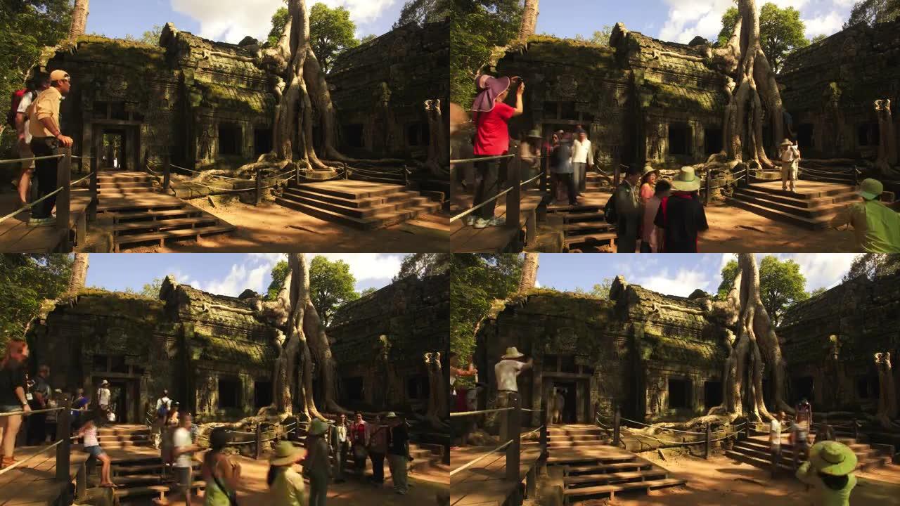 游客在时光倒流的柬埔寨吴哥的塔普伦寺乘坐phoeos