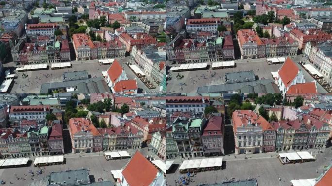 波兹南大部分旧市场广场的无人机景观。可见的彩色历史唐楼，大气的街道和城市的较新部分