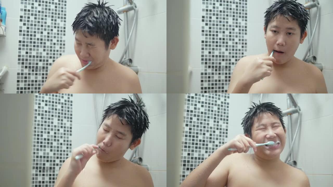 快乐的亚洲青春期男孩在家浴室刷牙，日常生活方式理念。