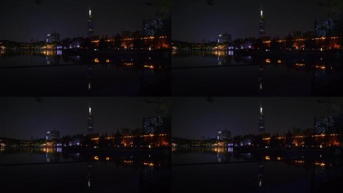 夜间照明南京市中央公园湖滨湾墙著名塔全景4k中国