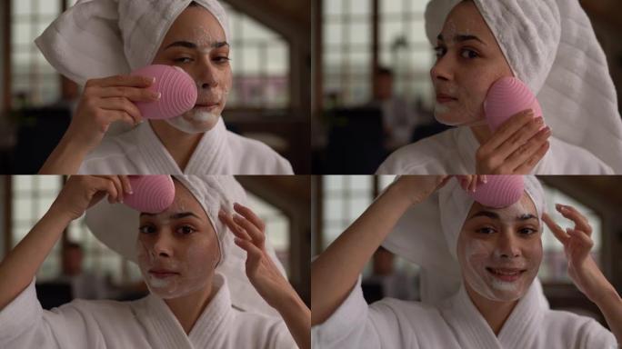 Woman cleaning face with beauty product