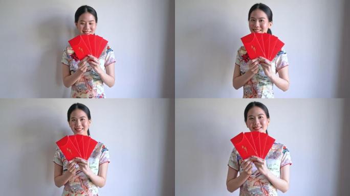 亚洲美女穿中国传统服饰红包或红包