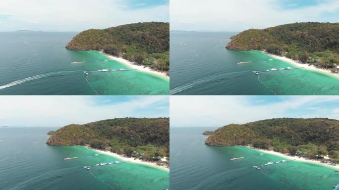 快艇从Koh Hey (珊瑚岛) 的香蕉海滩湾出发前往泰国主要土地-空中高全景拍摄